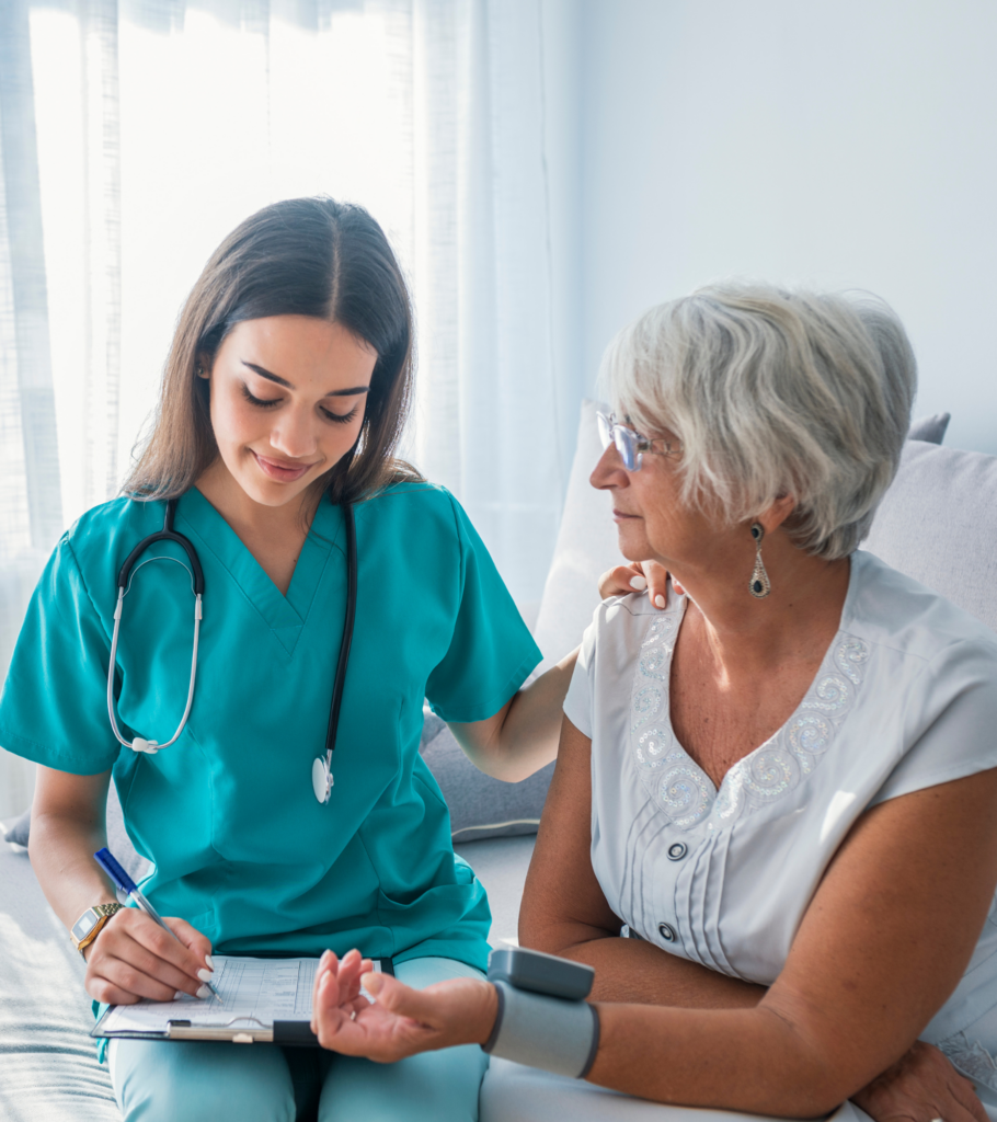 Nurse helping an older woman